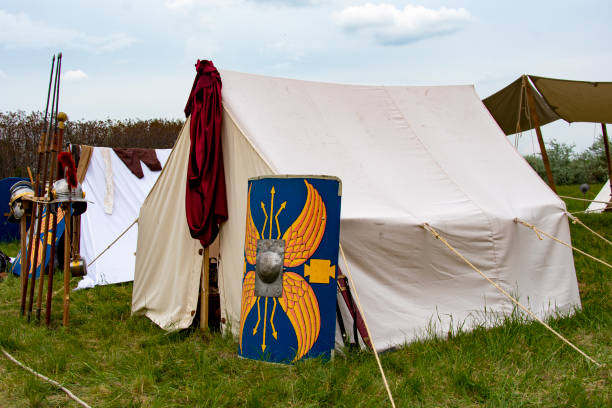 istock Ancient roman legion camp with tents and weapons 1473565492