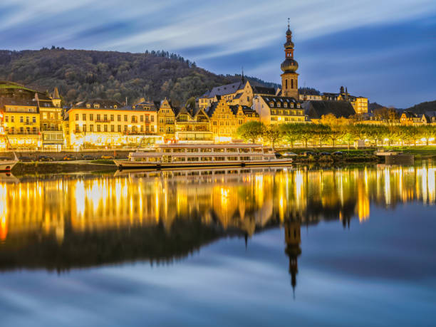 istock Cochem riverside buildings lit up after sunset and lights reflection on Moselle river in Cochem-Zell district in Rhineland-Palatinate, Germany 1473566644