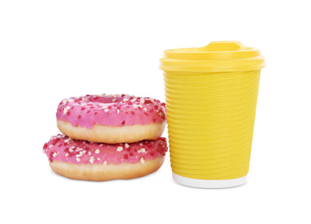 istock Two delicious donuts with sprinkles and hot drink isolated on white 1473566805