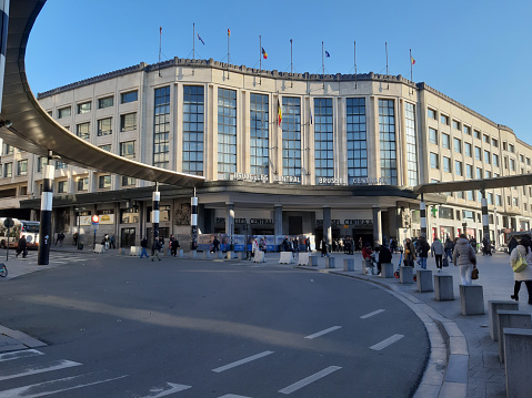 People Standing, Looking Around, Talking To One Another, Buying Snacks, Walking Around In Front Of Brussels Central Railway Station In Belgium Europe