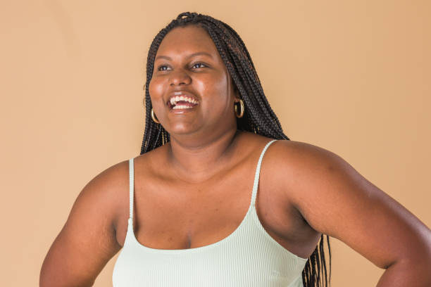 istock curvy plus size model. overweight body acceptance confidence. Latin Cuban body positive unretouched 1473571613