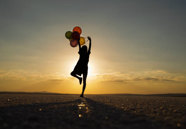Female dancer enjoying while dancing during sunset