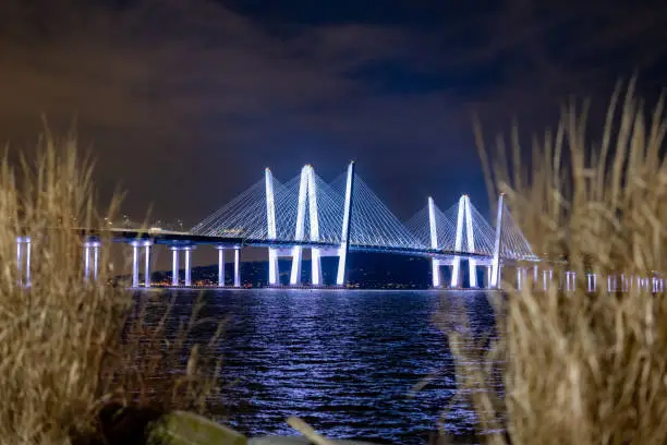 Photo of Night photo of the Governor Mario M. Cuomo Bridge, spanning the Hudson River between Tarrytown and Nyack