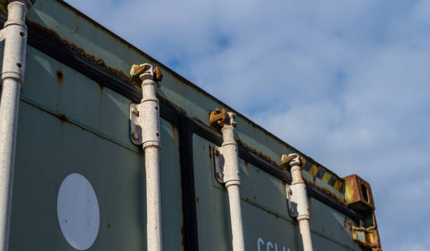 istock Rusty locks of a shipping container.. 1473575874