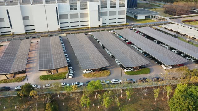 Aerial view of parking lot with solar panels