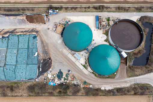 Bioenergy power plant that produces biogas from farm waste, aerial view.