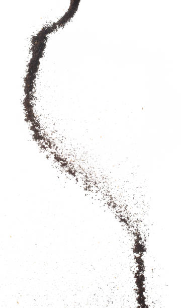 istock Coffee powder fly explosion, Coffee crushed ground float pouring, wave like smoke smell. Coffee ground powder splash throwing in mid Air. White background Isolated high speed shutter, freeze motion 1473584653