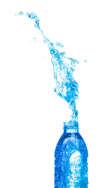 istock Drinking Water in Plastic Bottle fall fly in mid air, fresh water plastic bottle floating explosion. Fresh water plastic bottles pour throw in air. White background isolated freeze motion high speed 1473584668