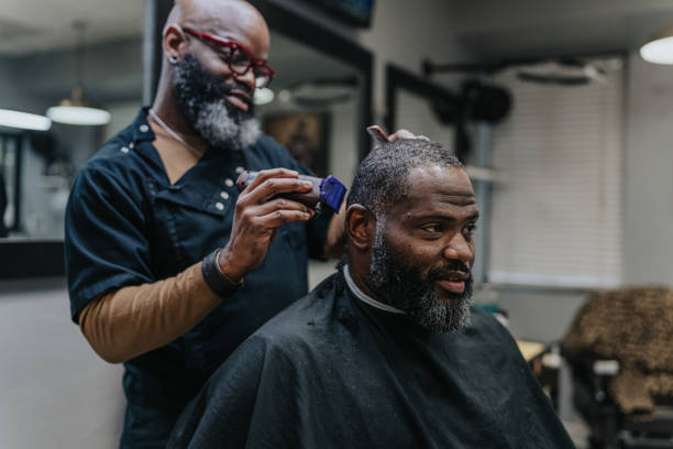 istock Black man having hair cut 1473584866