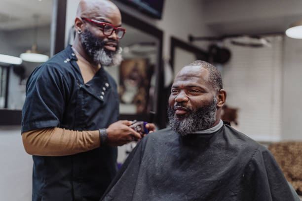 istock Satisfied customer at barber shop 1473584885