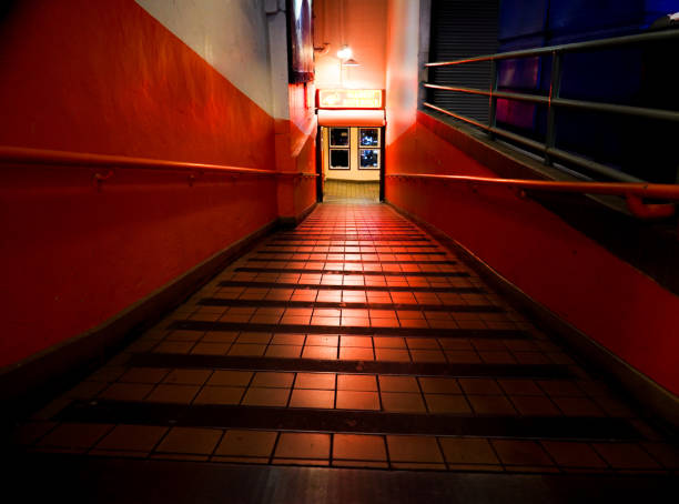 Back lite hallway leading down to the lower level inside the Pike's Place Market in Seattle Washington