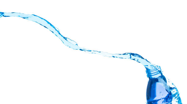 istock Drinking Water in Plastic Bottle fall fly in mid air, fresh water plastic bottle floating explosion. Fresh water plastic bottles pour throw in air. White background isolated freeze motion high speed 1473585104