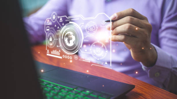 istock Businessman pointing at hologram with icon on virtual screen, Smart factory technology interface 1473585202