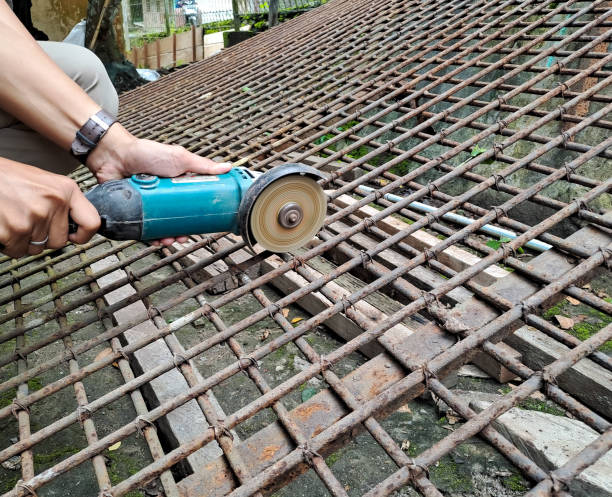 istock cutting scrap metal with a grinder 1473587836