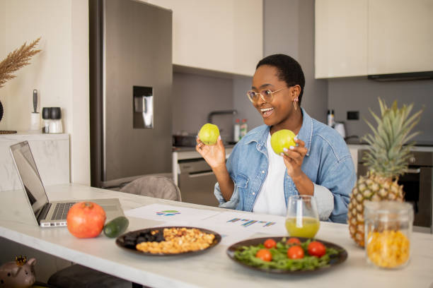 istock Young nutritionist is creating a meal plan 1473588147