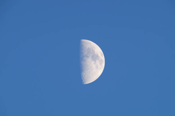 istock Moon in the morning blue sky. 1473588306