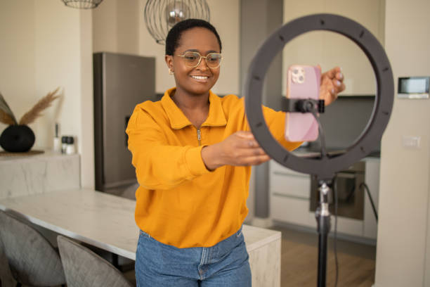 istock Young woman is recording a vlog 1473588965
