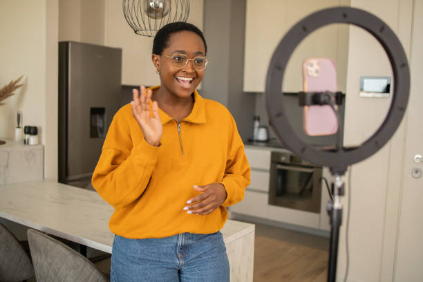 istock Young woman is recording a vlog 1473588967