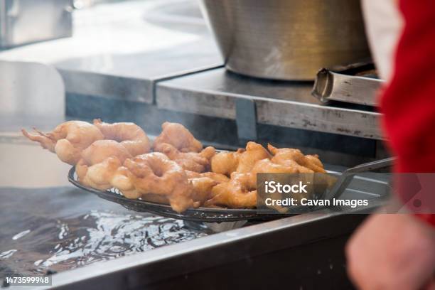 Detail Of Industrial Kitchen Detail Cooking Fritters In Hot Oil Stock Photo - Download Image Now