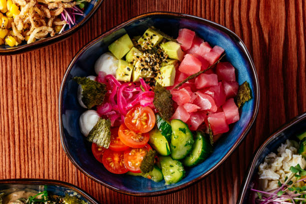 hawaiian poke bowl with tuna, vegetables, rice