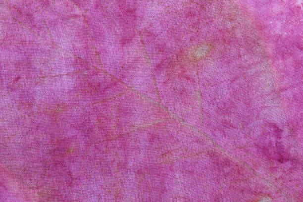 istock Texture background of natural yellow leaf from eco print process. 1473603886