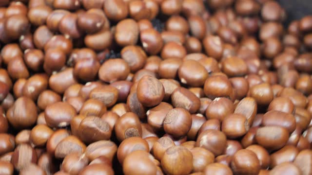 Close up chestnut roasted slow motion