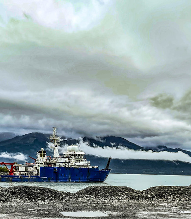 A very large research ship in the harbor of Seward Alaska