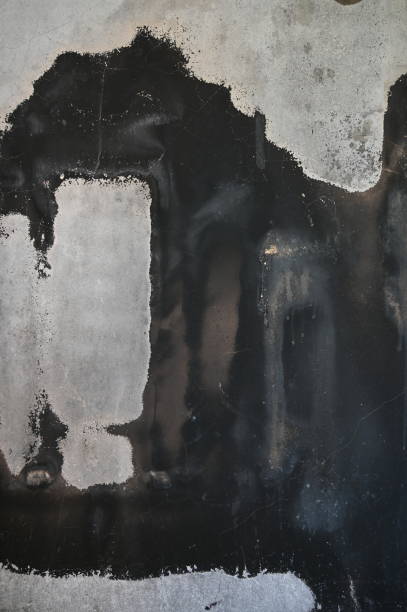 istock dirty black wall was burn from fire, construction industry 1473609114
