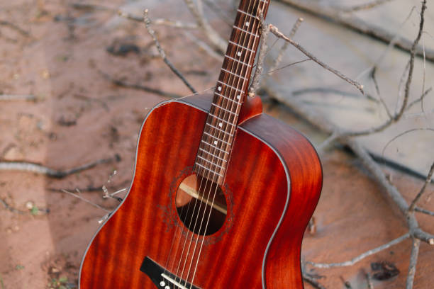 istock old wooden guitar 1473615772