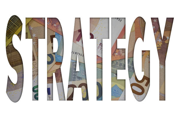 Strategy word with money. Paper currency background with different banknotes.