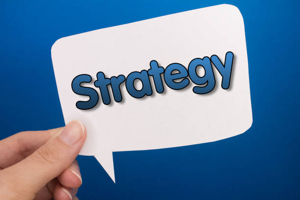 istock Speech bubble in front of colored background with Strategy text. 1473616427