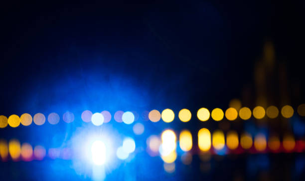 istock Abstract defocused lights by the lake 1473619783