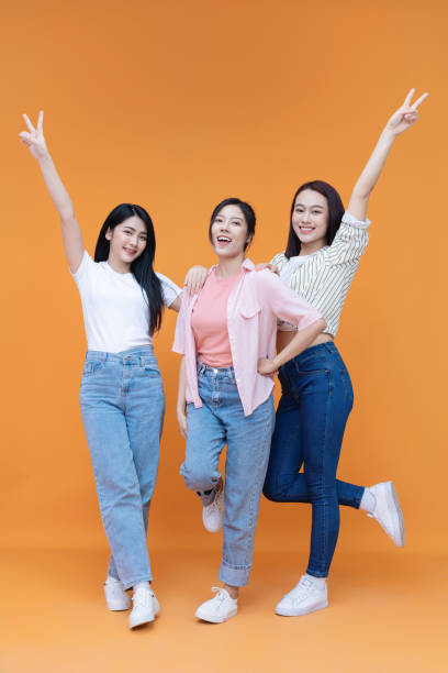istock Image of young three Asian girl on background 1473623656