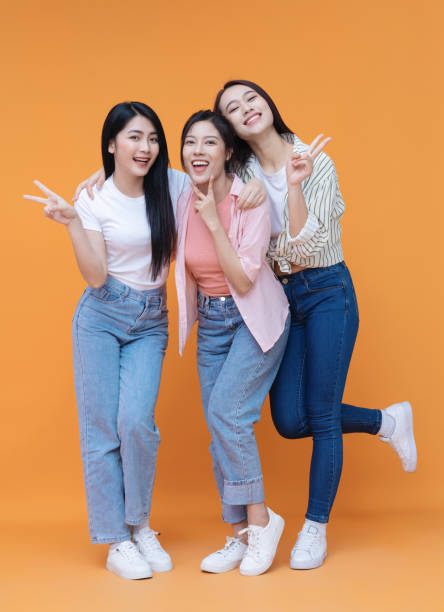 istock Image of young three Asian girl on background 1473623688