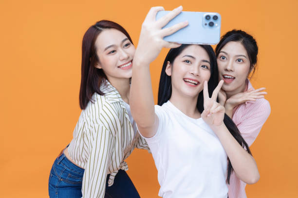 istock Image of young three Asian girl on background 1473623700