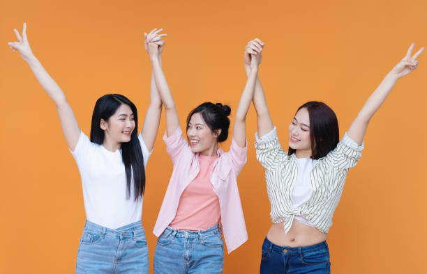 istock Image of young three Asian girl on background 1473623702