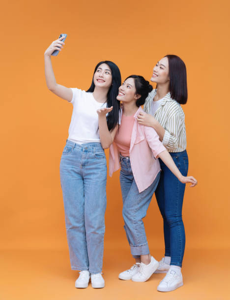 Image of young three Asian girl on background