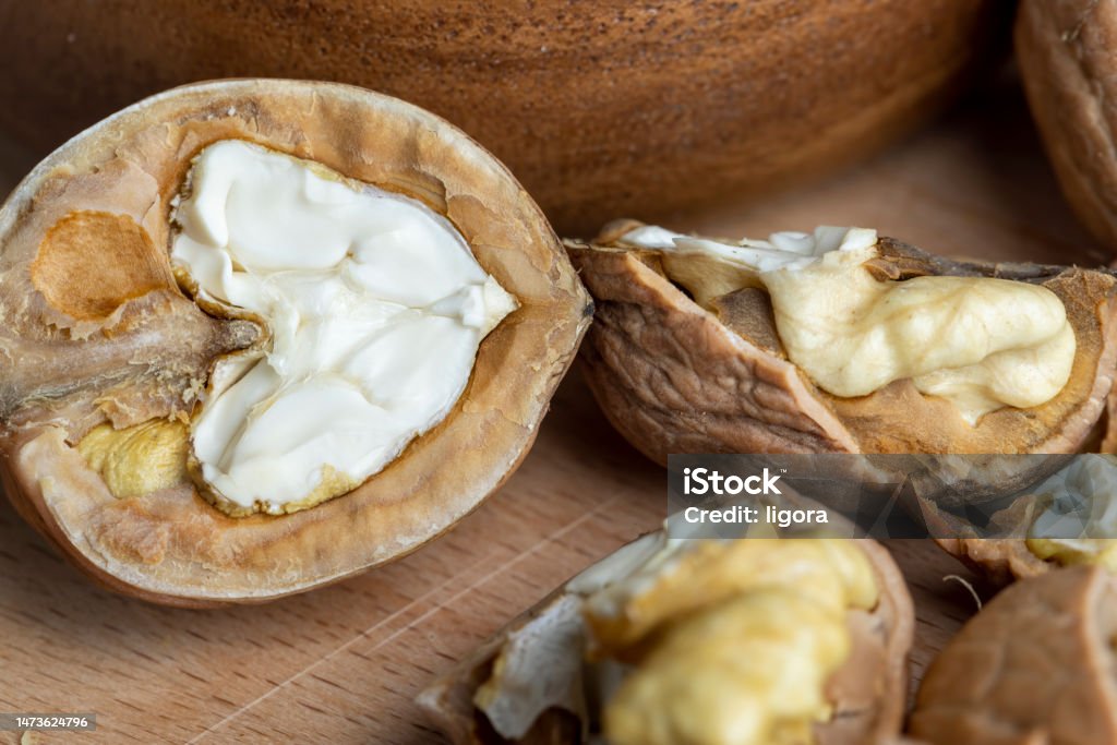 Walnut Open Shell Open And Broken Walnut Shells Lying On The Table Stock Photo - Download ...