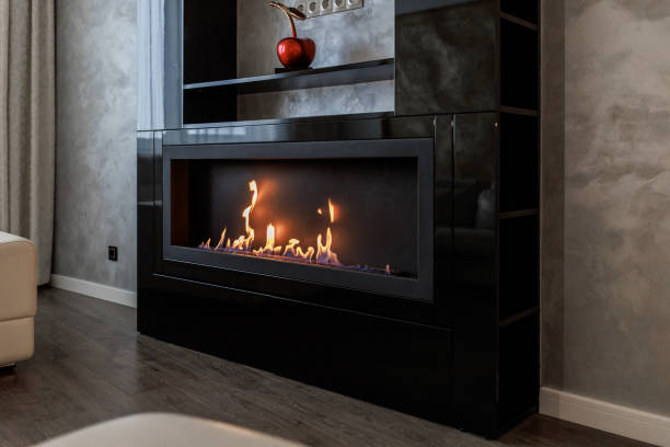istock Bio Fireplace burn on ethanol gas. Contemporary mount biofuel on ethanol fireplace fireplace. Modern smart ecological alternative technologies. Interior design of a house inside 1473624980