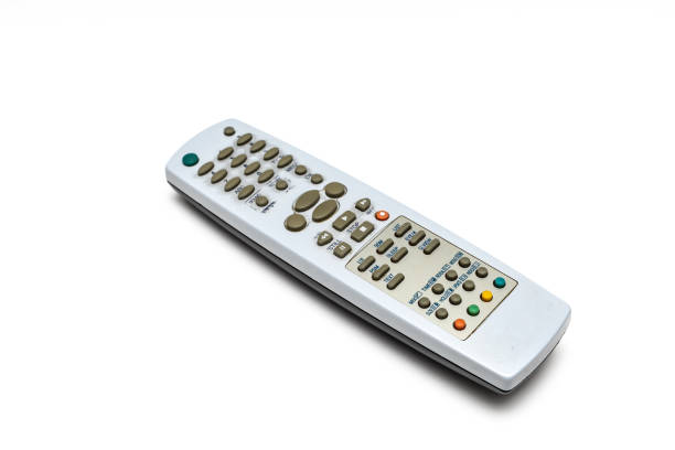 old tv remote with dirty buttons on white background. old tv remote.used tv remote.