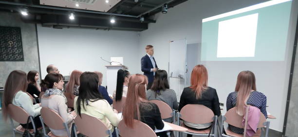 istock Manager makes a presentation to his business team 1473626270