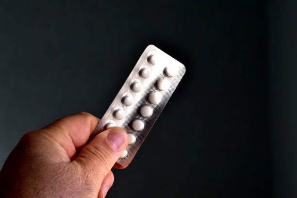 istock A pack of pills in a man's hand. 1473629891
