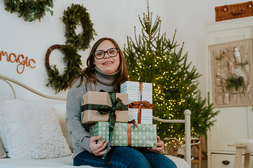 Young woman with Down Syndrome celebrate Christmas