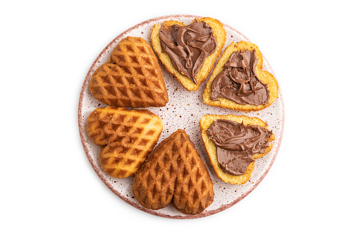 Homemade waffle with chocolate butter isolated on white background. top view, flat lay, close up.