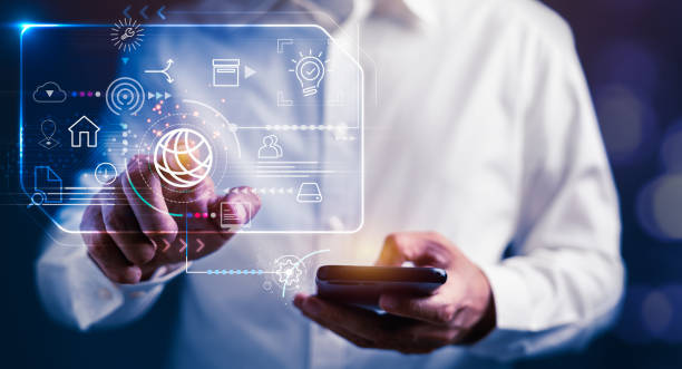istock Businessman is touching business strategy icons on virtual display for planning target 1473636257