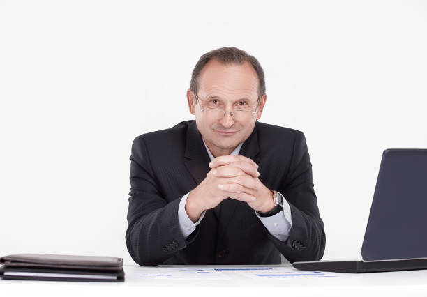 close up. Executive businessman sitting at his Desk .photo with copy space