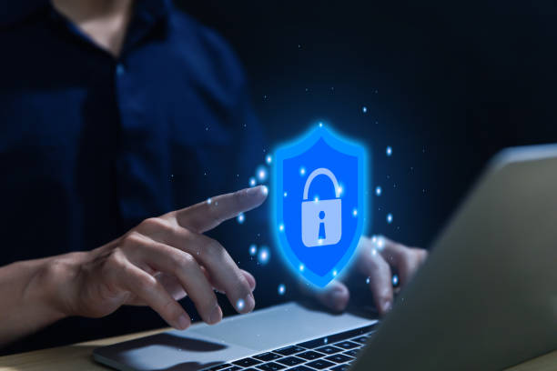 istock Businessman touching shield icon with lock sign computer password protection concept internet network security 1473638815