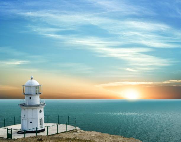 istock lighthouse in a marine cape on a sunset 1473640464