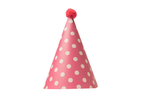 istock Bright and colorful birthday cap isolated on a white background. 1473646883