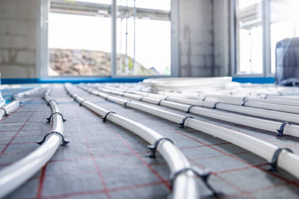 Pipes for hydronic underfloor heating stock photo